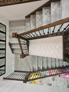 light grey squared landing staircase with dark railing mixed shot frame (5)